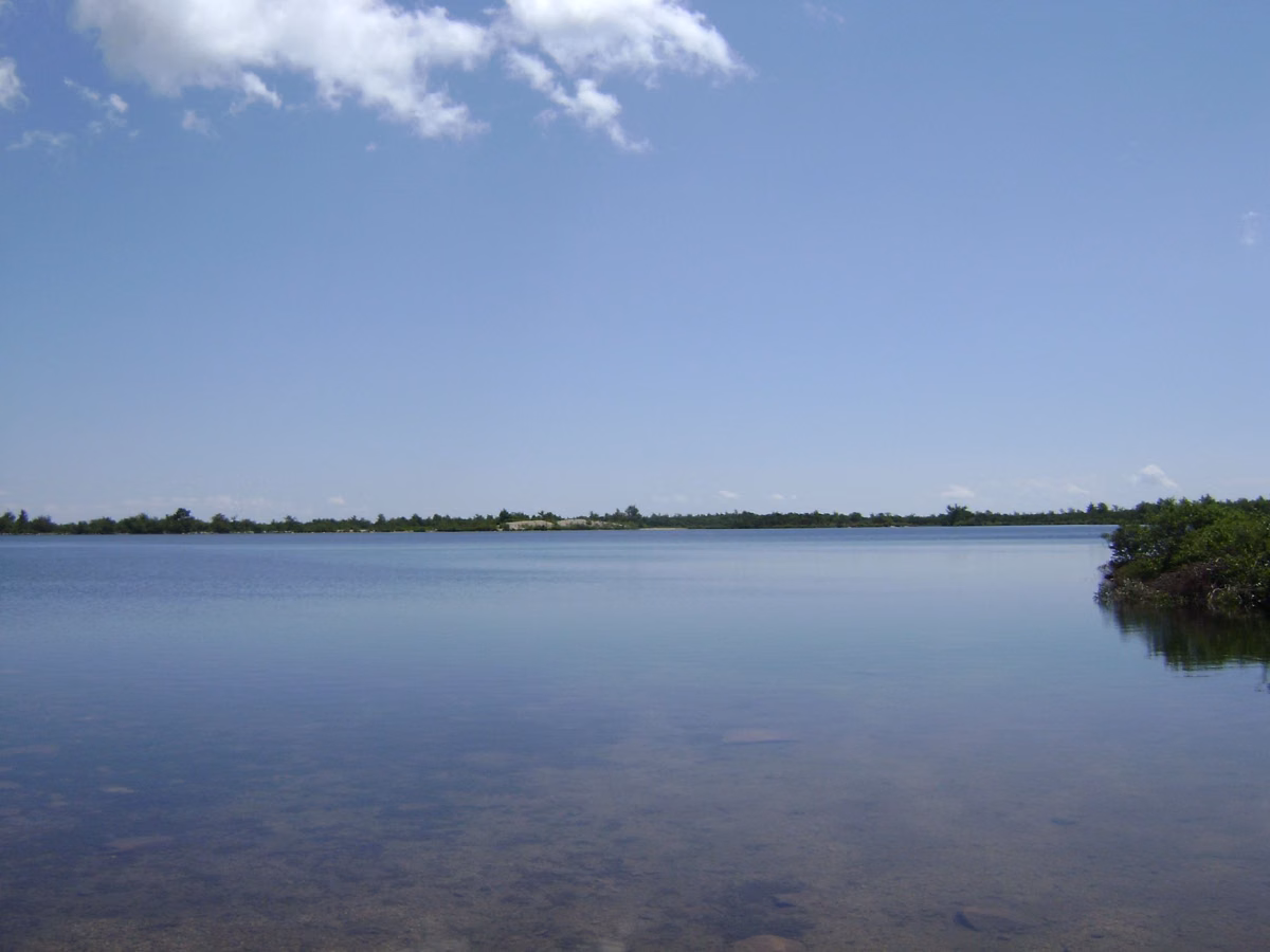 Lake Maratanza, the ridge-top lake in the Sam's Point Area, under a pale summer sky
